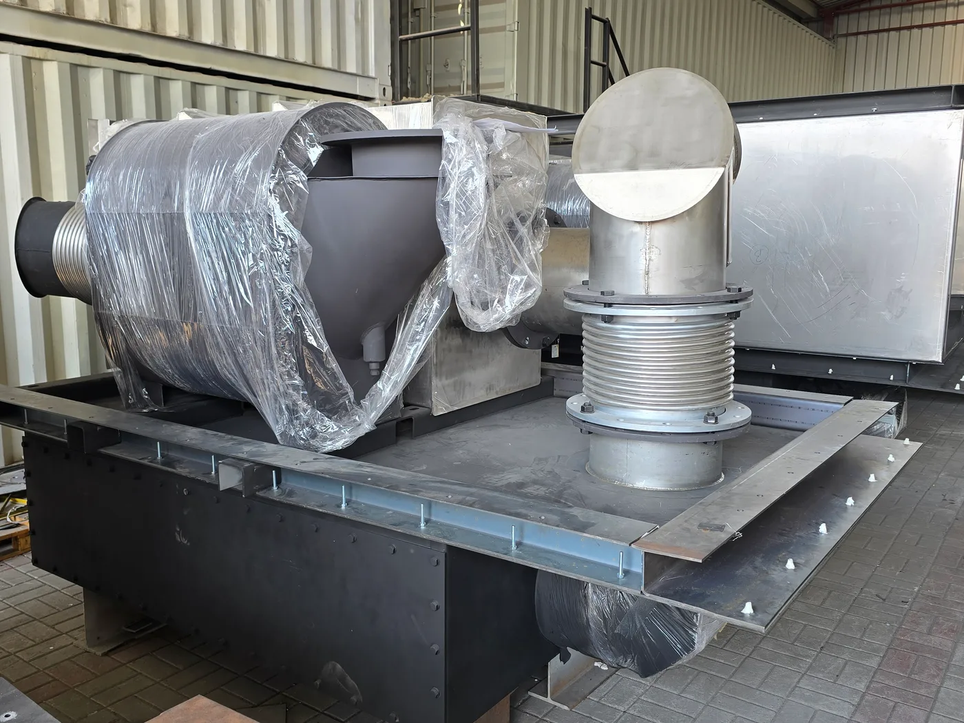 SCR roof skid for a containerised power plant genset, with the filter housing, mixing section, bellows compensator and outlet cap, before shipment