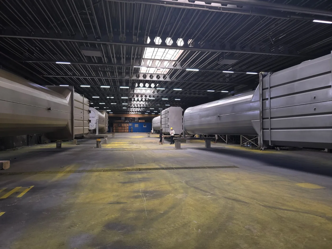 Exhaust systems for the UK power plant being painted at Axces Production